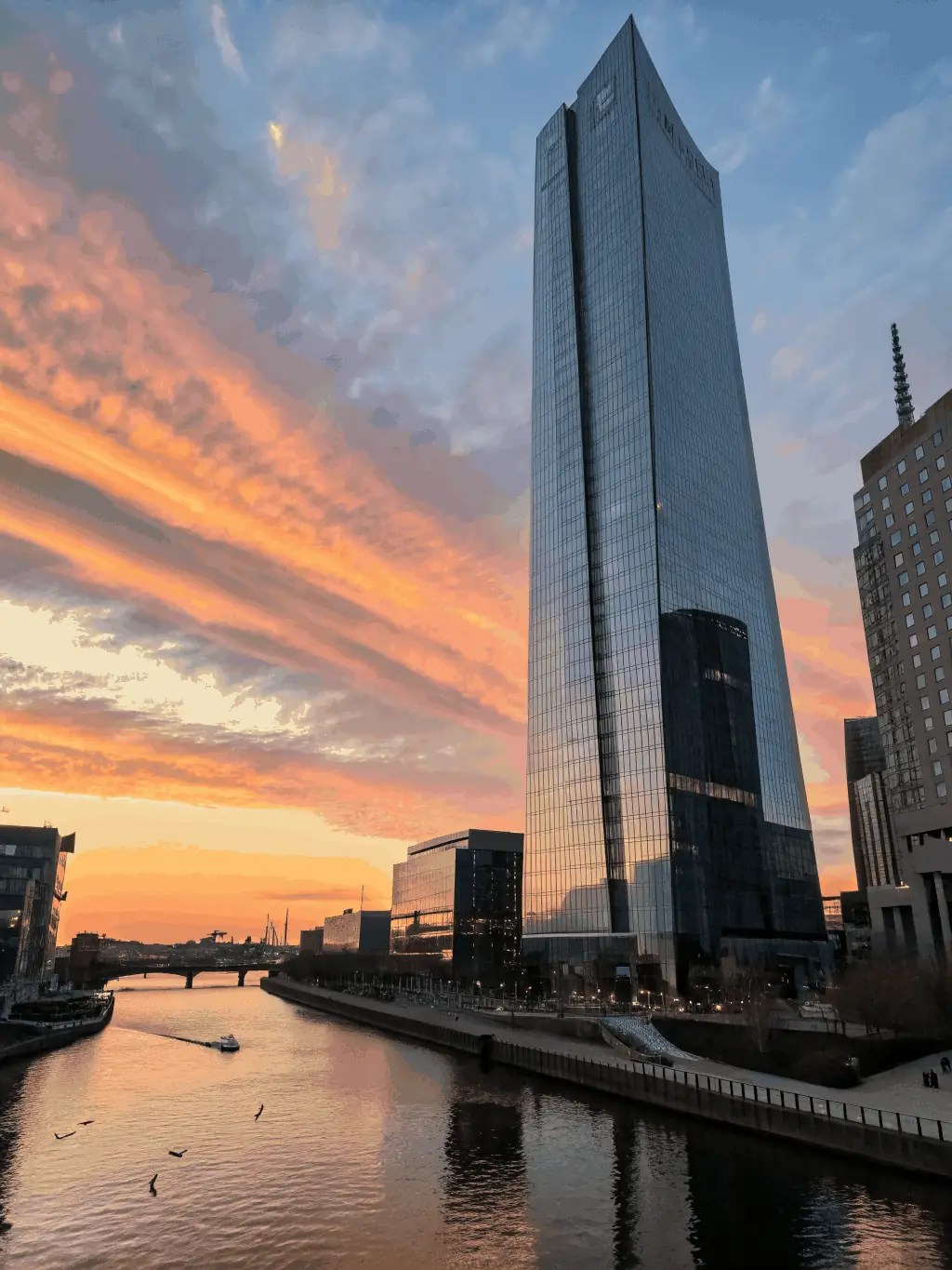 A sleek image of a high-rise skyline at sunset, symbolizing strategic oversight and global reach, used to represent Lexum House of Law's Strategic Legal Counsel service.